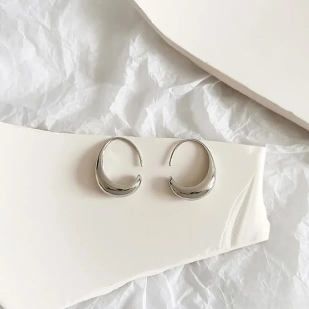 Elegante Ohrringe aus Gold und Silber